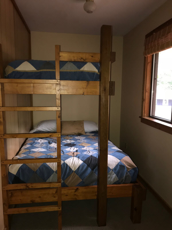 The Redlin cottage double bed on bottom twin bed on top bunk bedroom Moonlight bay resort