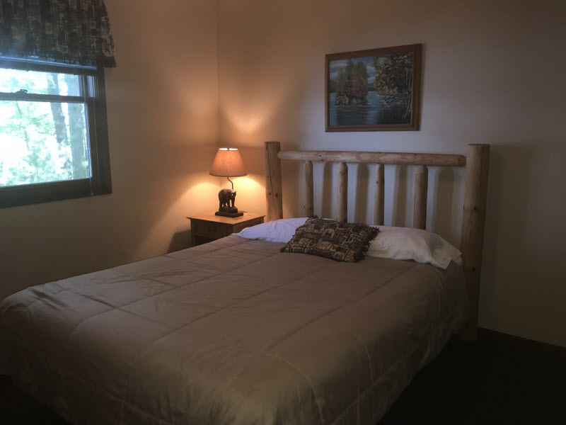 The Bear Cottage queen bedroom Moonlight bay resort